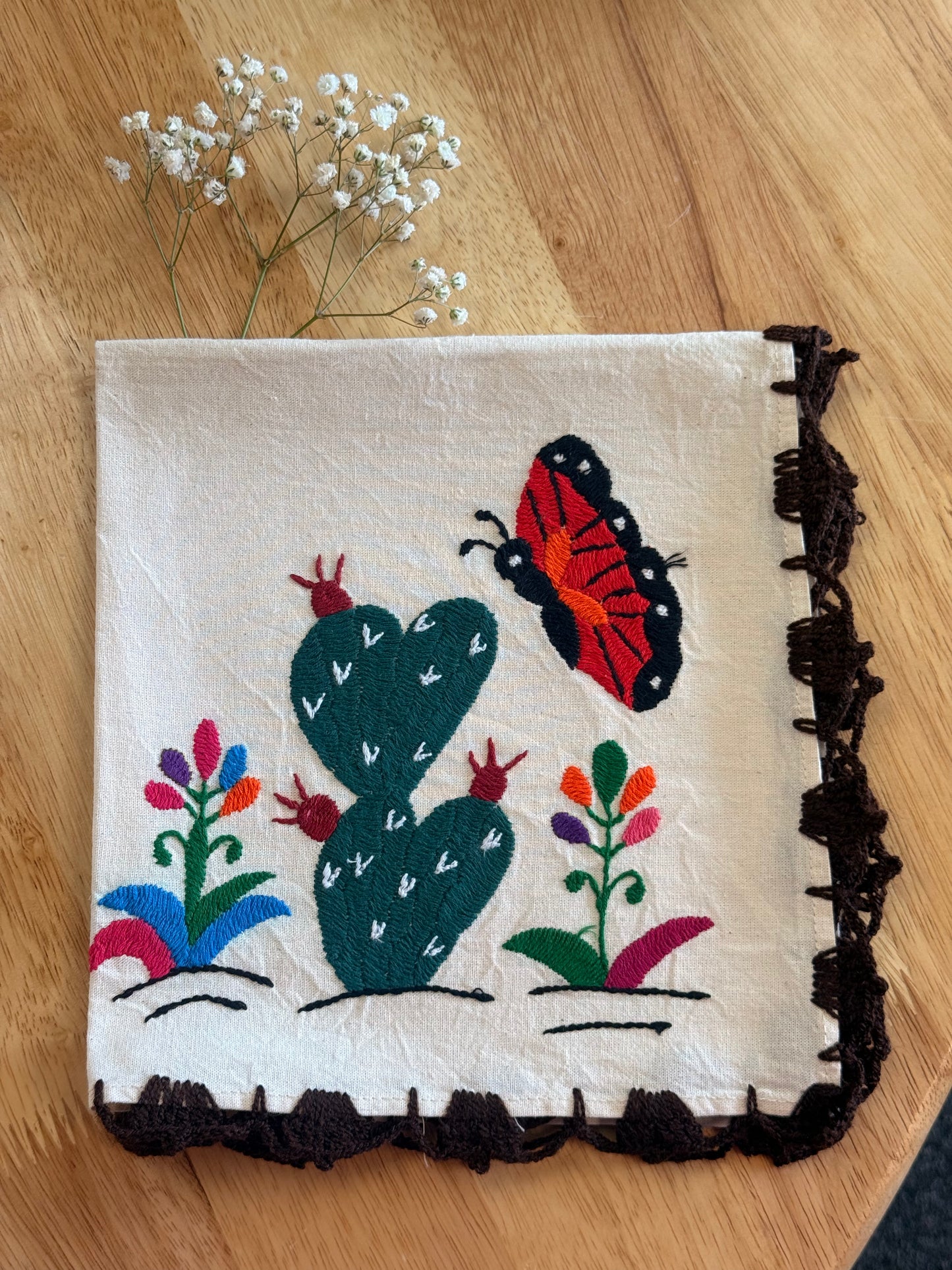 LIMITED EDITION: “Mariposa & Nopal Hand-Embroidered Napkin.”